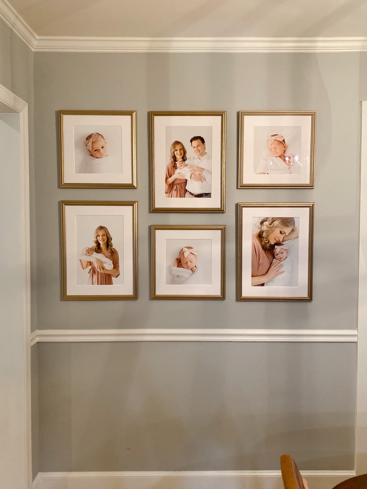 Gallery wall hanging in clients home designed by Atlanta Newborn Photographer, Lindsey Powell Photography