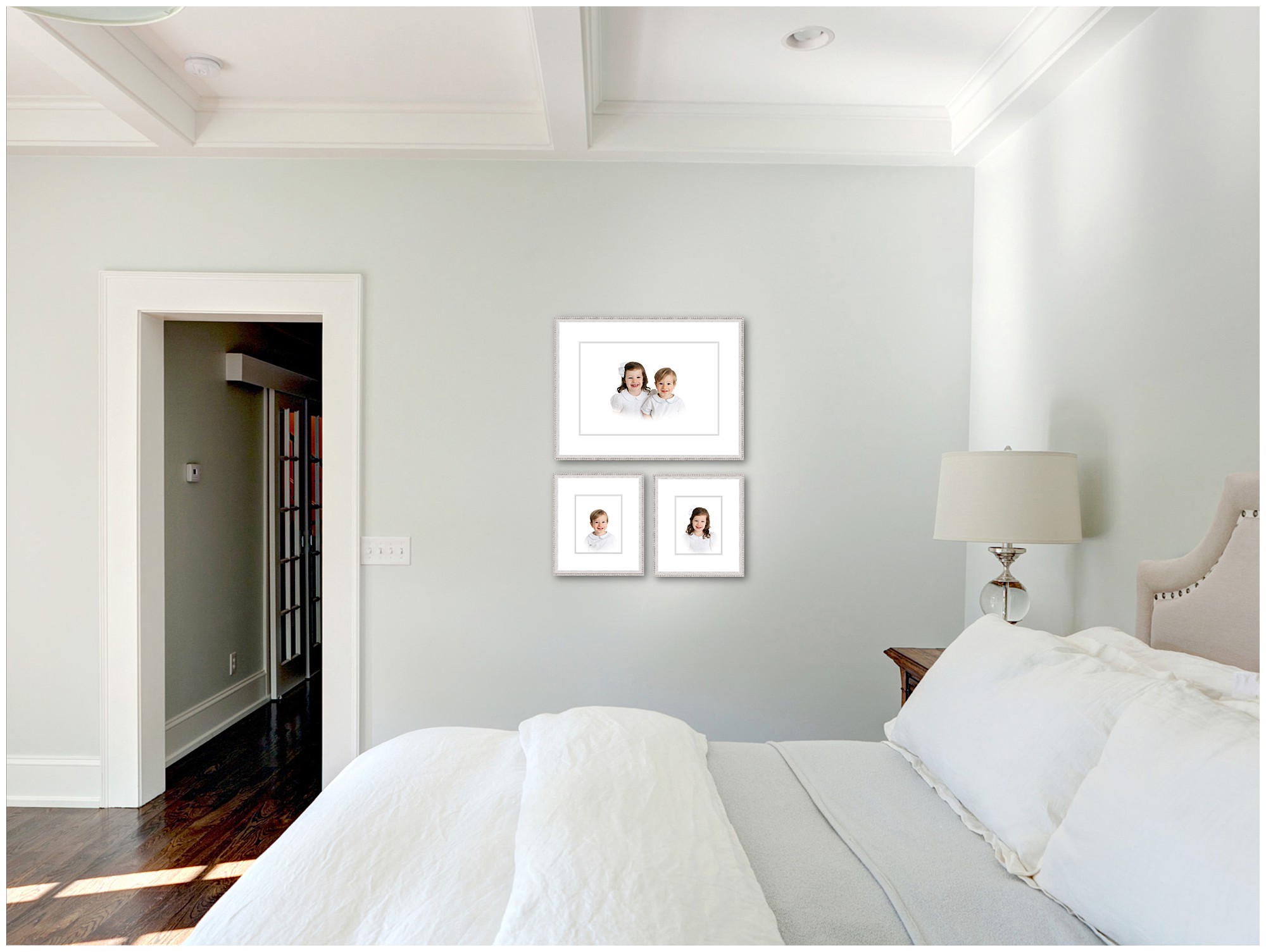 A photo of three frames hanging on the wall too show what Atlanta heirloom portraits will look like framed in a group.