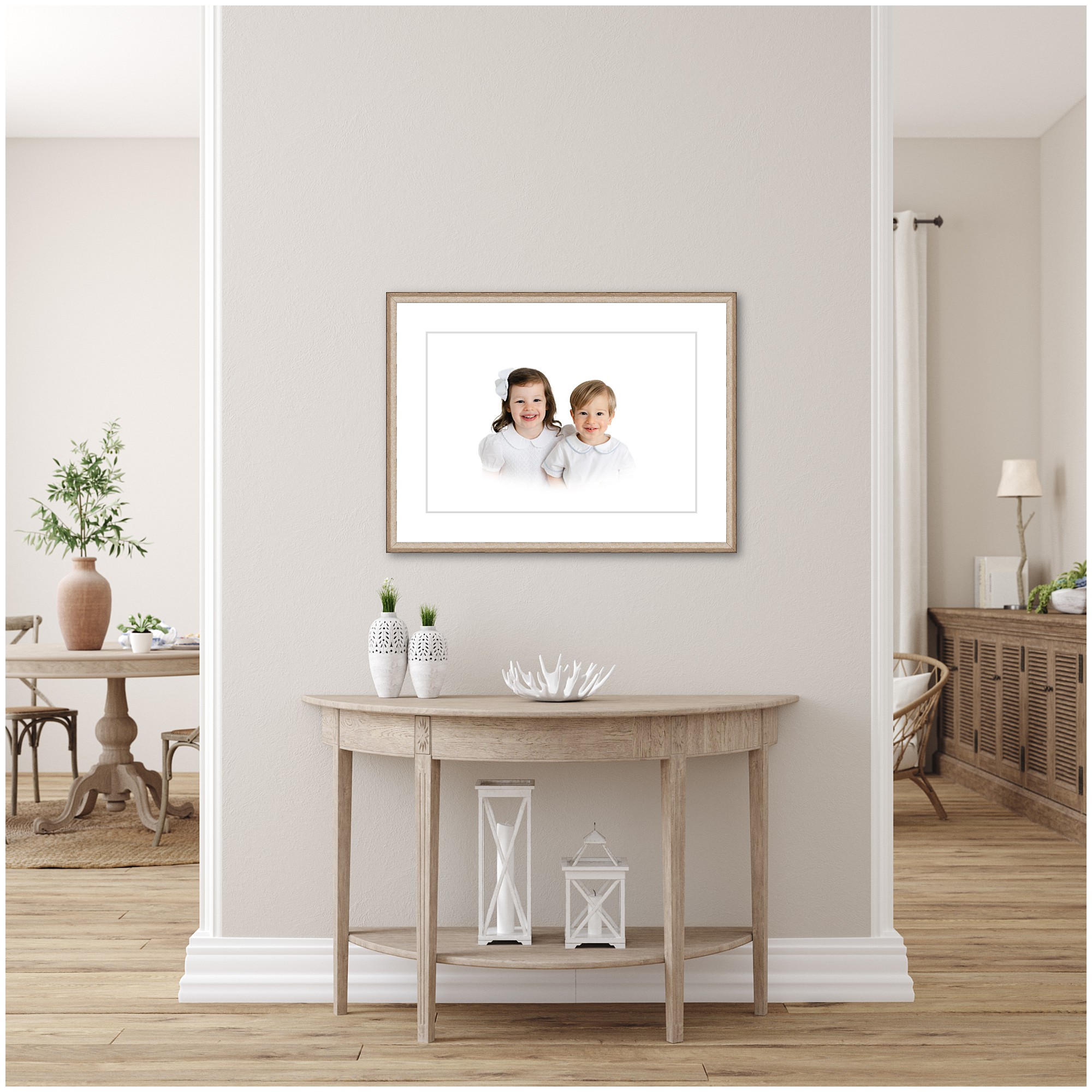 A large frame featuring a portrait of a young brother and sister duo.