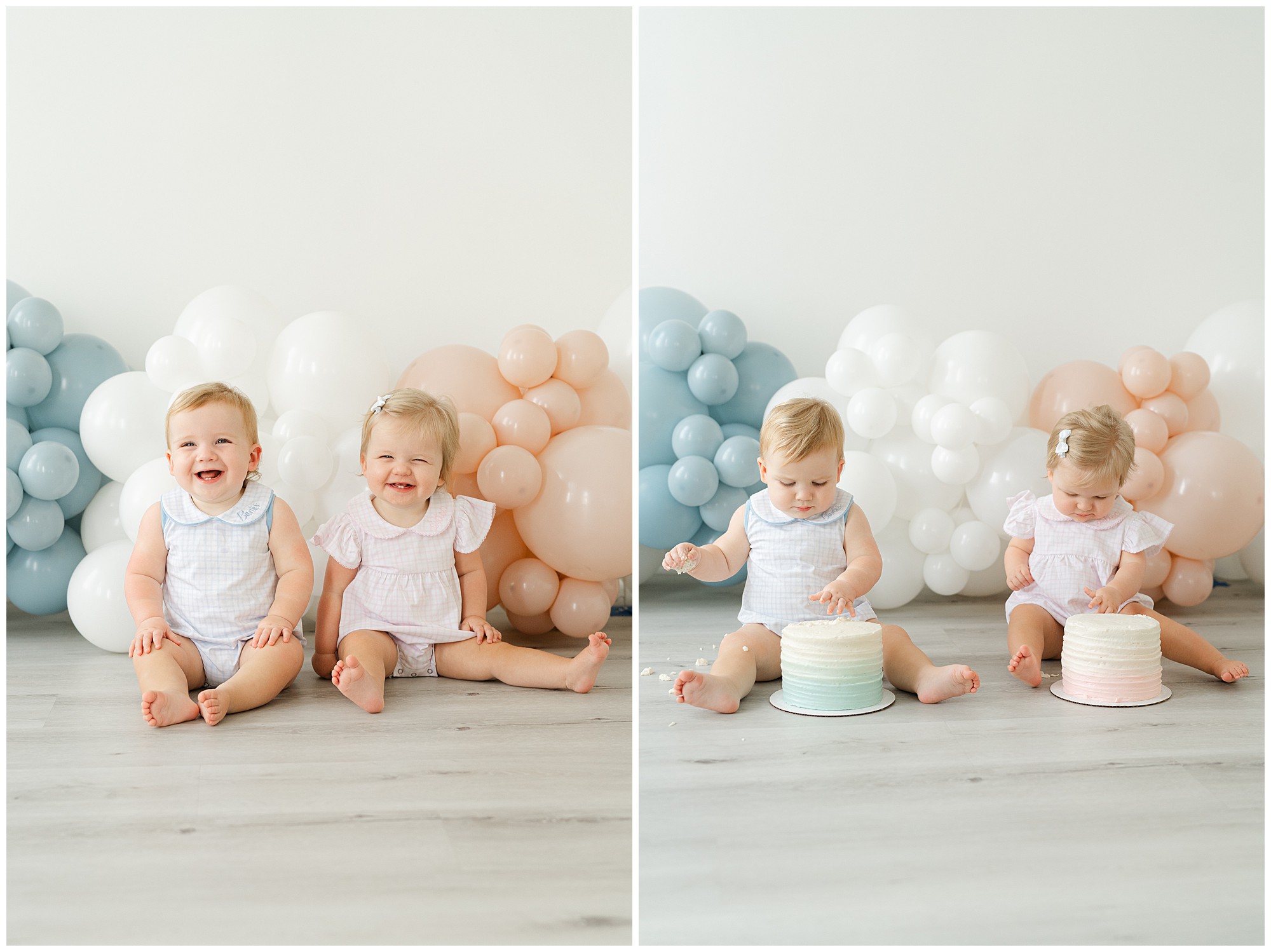 A one year old girl and boy smiling for portraits in front of a blue, white, and pink balloon garland during their Atlanta Cake Smash session for twins